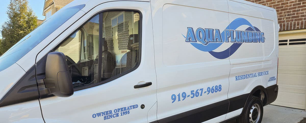 Professional soft washing truck with equipment for exterior cleaning services in Garner, NC.