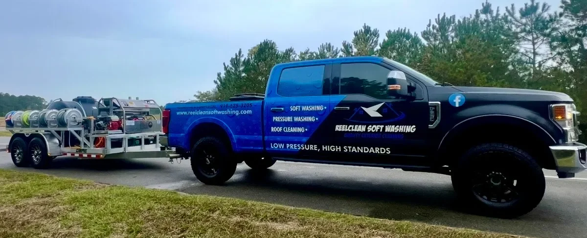 Professional soft washing truck with equipment for exterior cleaning services in Garner, NC.